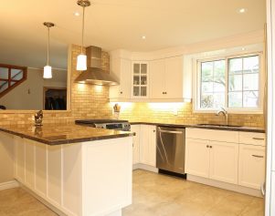 With the right kitchen design team, even an older boxed in kitchen can be remodelled into an open bright space.